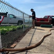 Setting a chain-link fence post