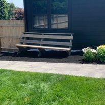 Built-in bench along a privacy fence