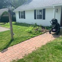 Brick walkway to a front door