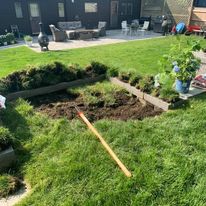 Lawn with a new garden bed cut in