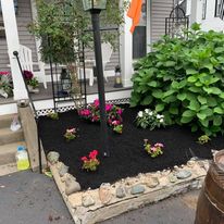 Flower bed with stone edging